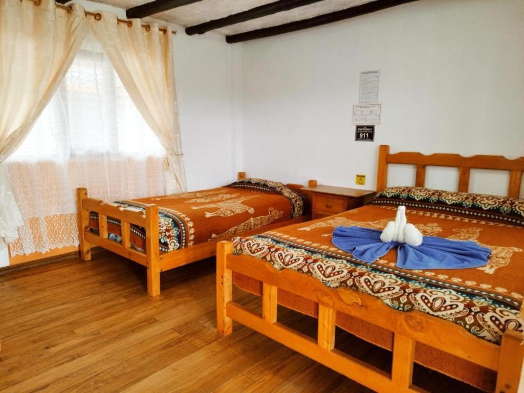 Hostal Taita Cristobal Isinlivi Bagian luar foto